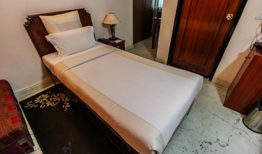 Hotel Pigeon International Bangalore Phòng bức ảnh