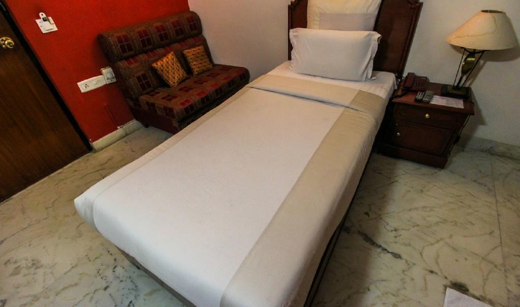 Hotel Pigeon International Bangalore Phòng bức ảnh