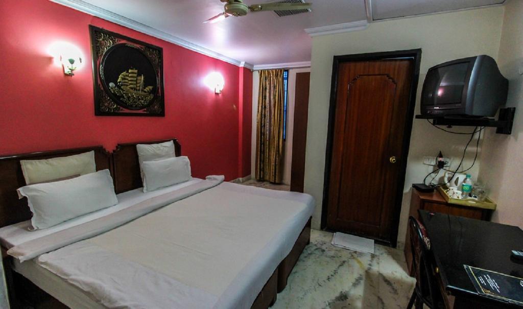 Hotel Pigeon International Bangalore Phòng bức ảnh