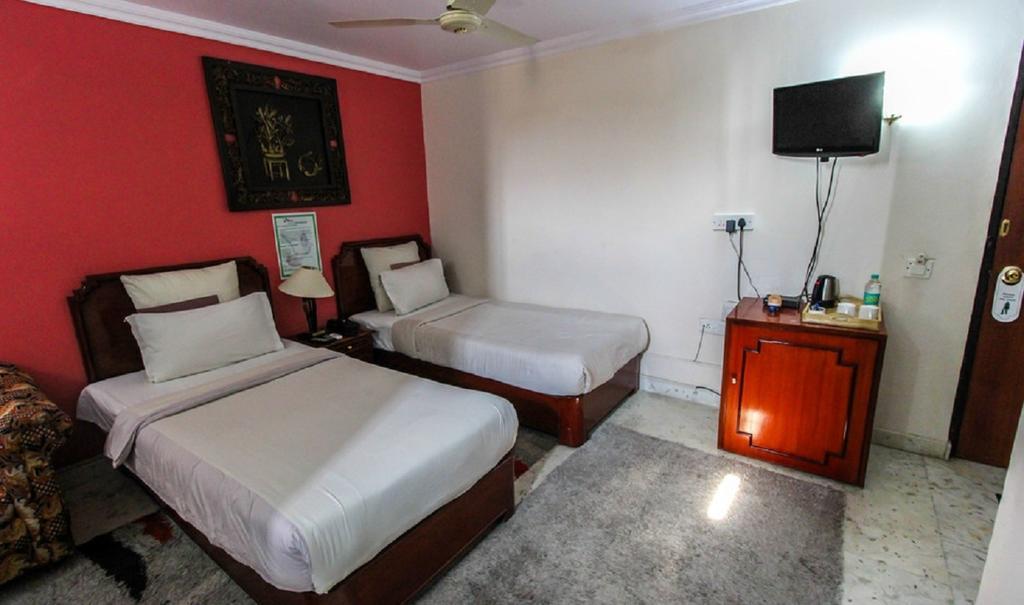 Hotel Pigeon International Bangalore Phòng bức ảnh