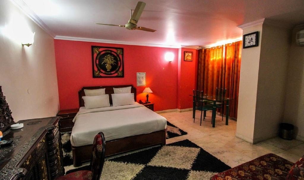 Hotel Pigeon International Bangalore Phòng bức ảnh