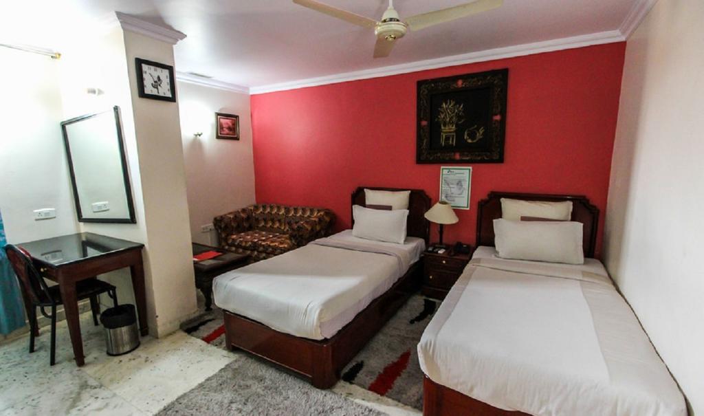 Hotel Pigeon International Bangalore Phòng bức ảnh