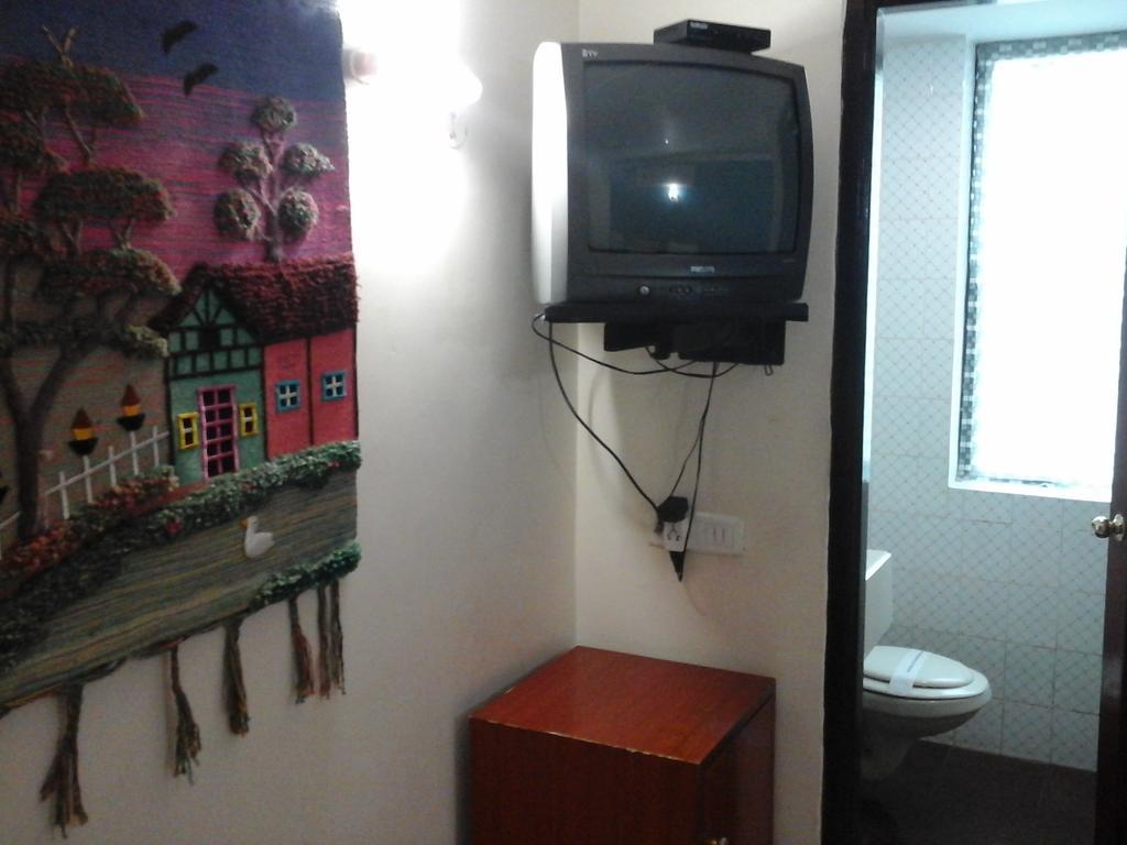 Hotel Pigeon International Bangalore Phòng bức ảnh